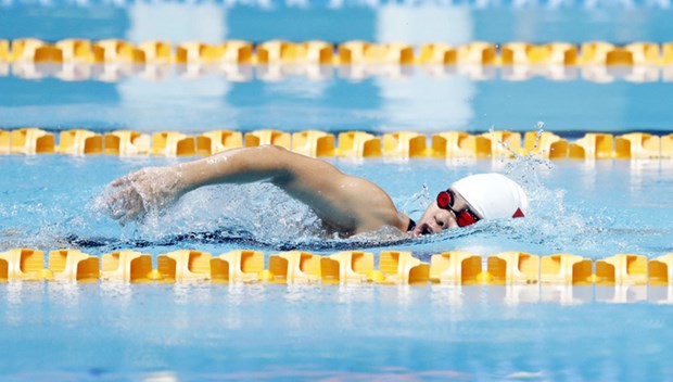 越南选手韦氏恒在杭州亚残运会游泳项目女子100米自由泳S7级比赛中获得铜牌 hinh anh 1