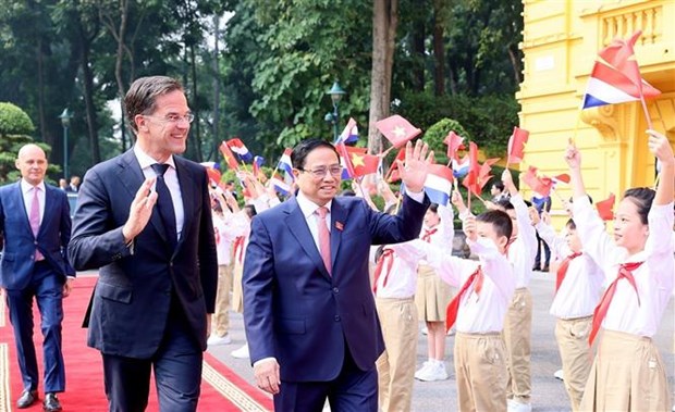 越南政府总理范明政为荷兰首相举行正式欢迎仪式 hinh anh 2