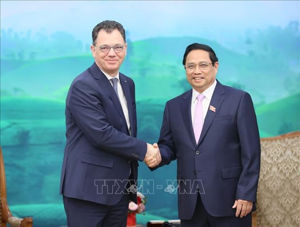 越南政府总理范明政会见罗马尼亚经济、创业和旅游部长斯特凡·拉杜·奥普雷亚 hinh anh 1