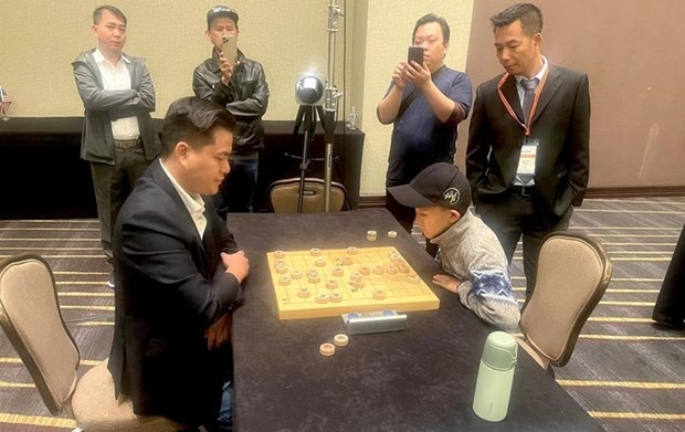 越南棋手赖李兄夺得国际象棋世界冠军 hinh anh 1