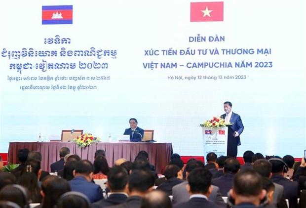 政府总理范明政与柬埔寨首相洪玛奈出席越柬贸易投资促进论坛 hinh anh 3