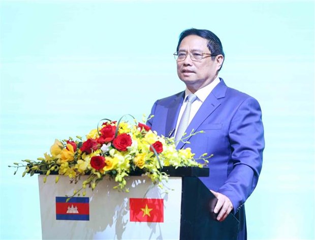 政府总理范明政与柬埔寨首相洪玛奈出席越柬贸易投资促进论坛 hinh anh 2
