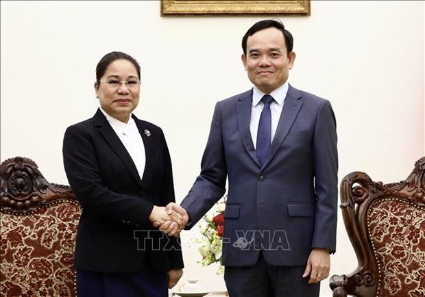 政府副总理陈流光会见老挝新闻文化和旅游部部长宋莎婉·维雅吉 hinh anh 1