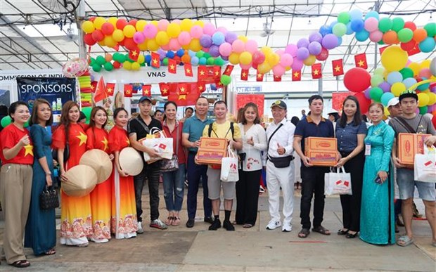 越南为新加坡2023年国际移民日纪念活动做出积极贡献 hinh anh 1