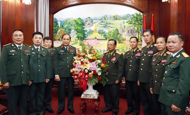 越南始终与老挝人民军的强大发展并肩同行 hinh anh 2