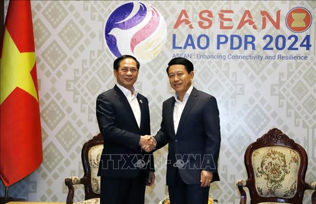 越南与柬埔寨保持紧密配合 援助老挝成功担任2024年东盟轮值主席国 hinh anh 1