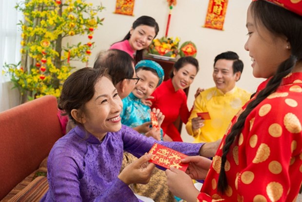 春节派压岁钱——越南由来已久的传统习俗 hinh anh 1