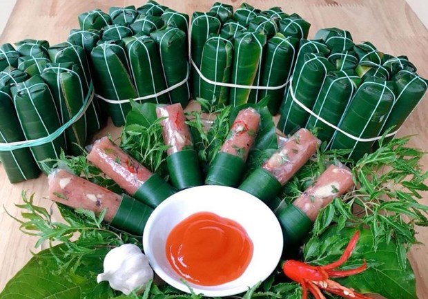 越南酸肉卷被列入全球最佳的有辣椒美食榜单 hinh anh 1