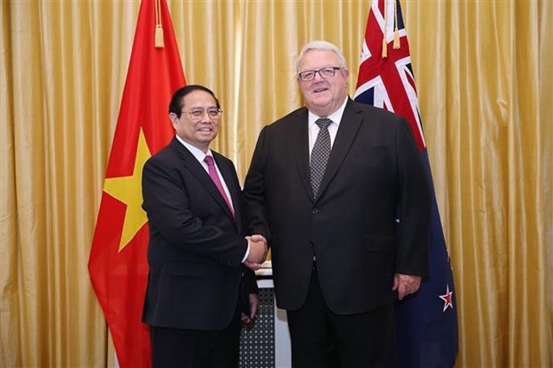 越南政府总理范明政会见新西兰国民议会议长 hinh anh 1
