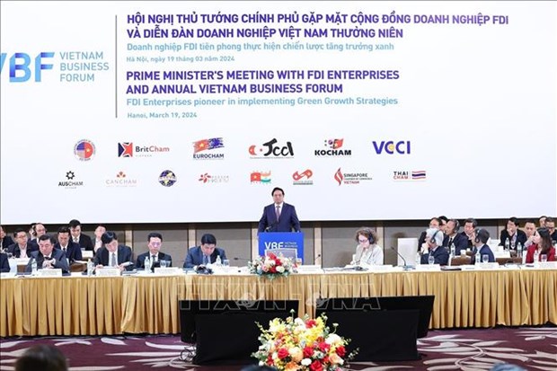 越南政府总理范明政:越南实现“三个保障、三个突破和三个加强”为企业保驾护航 hinh anh 1