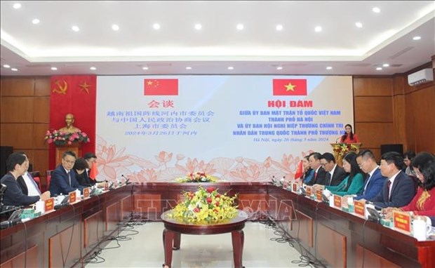 促进越南祖国阵线河内市委员会和上海市政协的合作 hinh anh 1