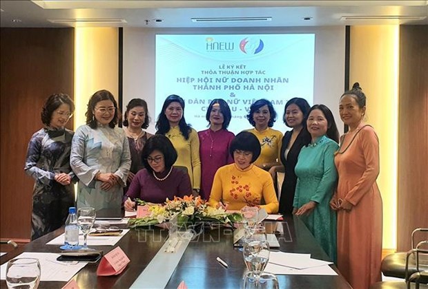 河内女企业家协会签署合作协议 提高越南妇女地位和贡献 hinh anh 1