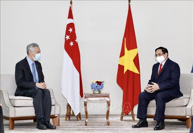 越南政府总理范明政分别会见埔寨首相、新加坡总理和马来西亚总理 hinh anh 2