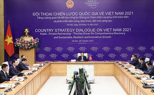政府总理范明政共同主持第一次越南与世界经济论坛国家战略对话 hinh anh 2