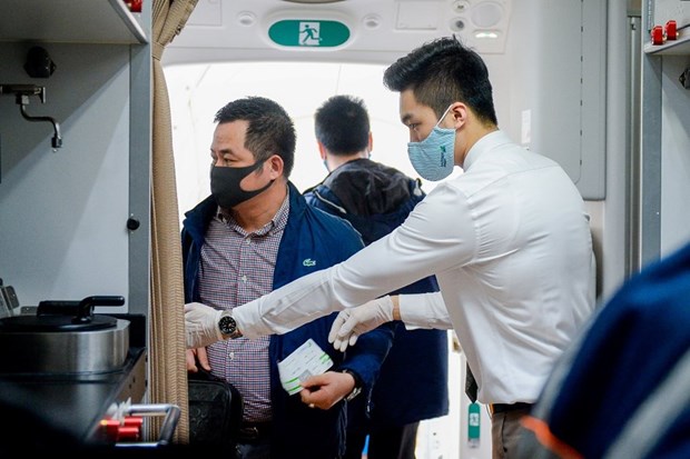 组图：新冠疫情演变复杂 航空公司强化旅客健康保护措施 hinh anh 10